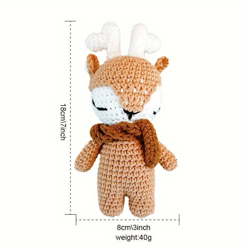 The perfect first Christmas gift for newborns: a handmade crochet baby animal Christmas reindeer doll. Perfect for little ones to snuggle with during the holiday season.