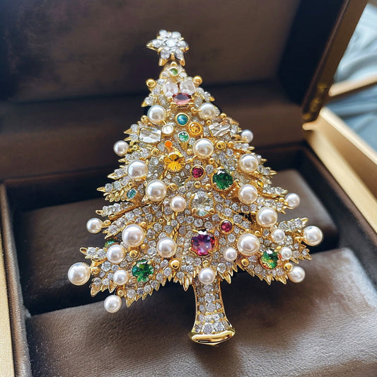 The best gift for the holidays - an elegant and luxurious crystal brooch shaped like a Christmas tree, perfect for both women and men.