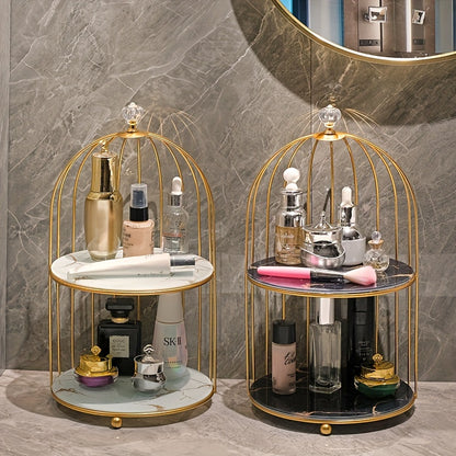 Elegant golden and white marble birdcage-inspired 2-tier makeup organizer with stainless steel rack and electrostatic spray finish. Portable and freestanding for bathroom and bedroom decor.