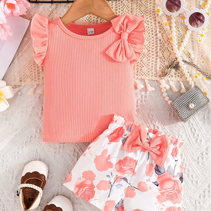 Cute girls' summer outfit: Maroon ribbed T-shirt with bow and floral print shorts set - Made with easy-care polyester blend, machine washable, ideal for outdoor wear.