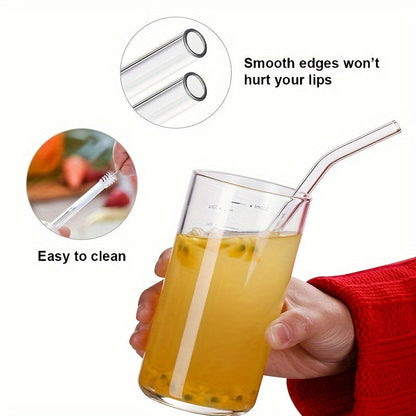 A package containing 6 high borosilicate transparent glass straws and 1 cleaning brush. These heat-resistant, washable, and reusable straws are perfect for enjoying your favorite drinks.