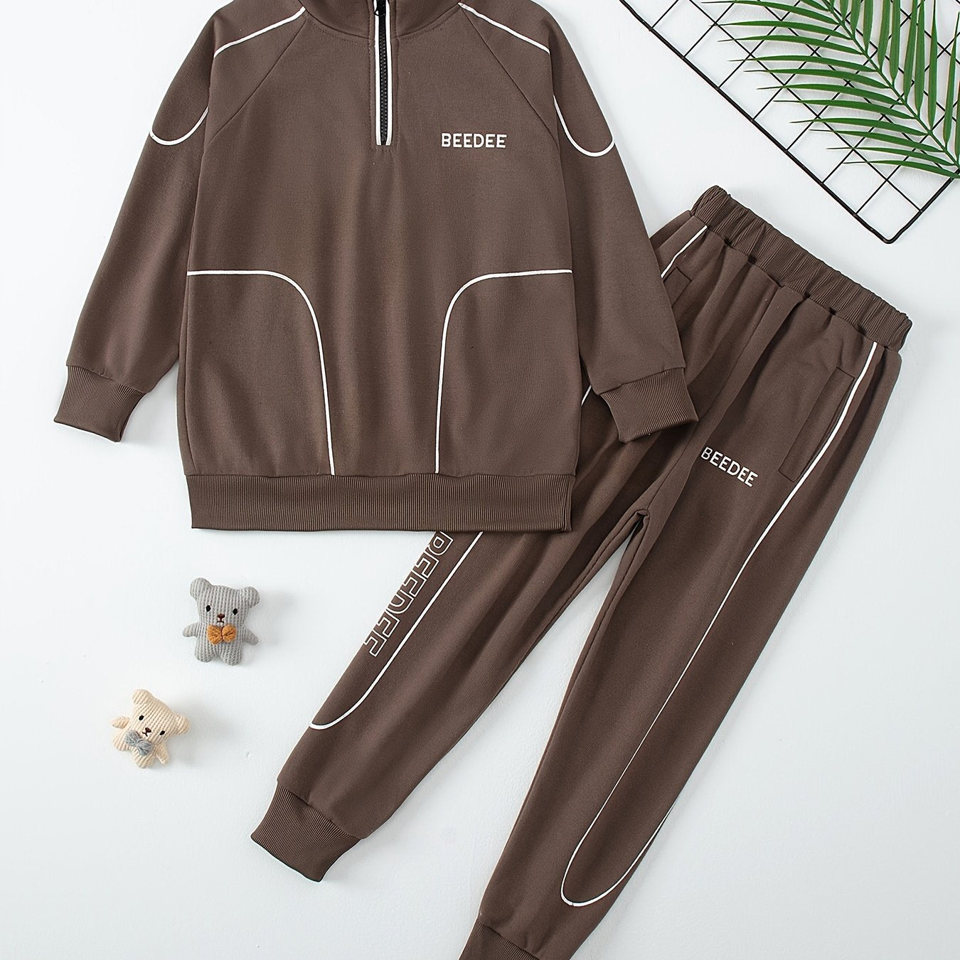 Boys' casual sportswear set includes zip-up jacket, joggers, and long sleeve shirt. Made of polyester, ideal for outdoor activities in spring and fall.