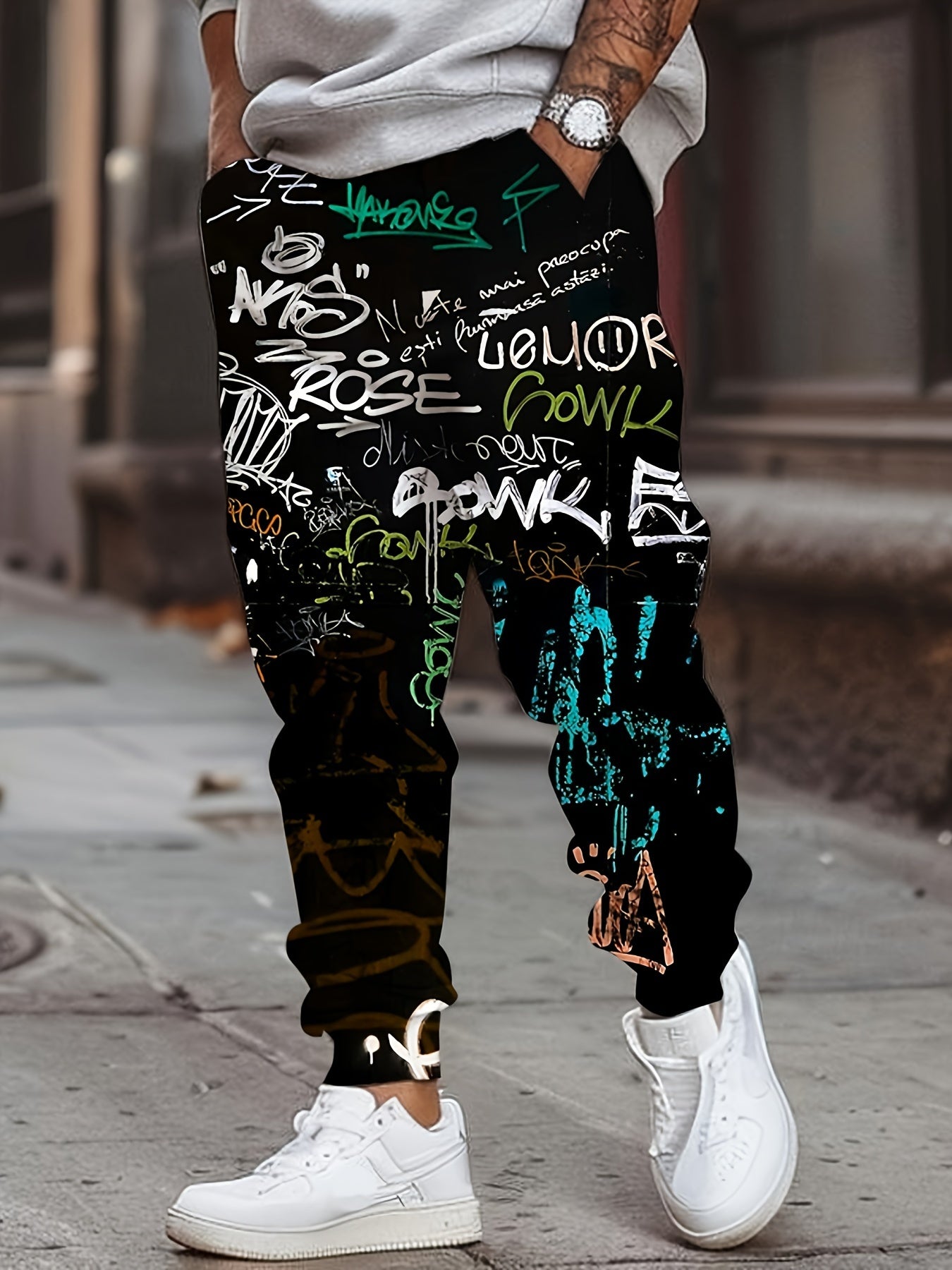 Men's polyester sweatpants with 3D graffiti print, drawstring, pockets, slight stretch, regular fit joggers.