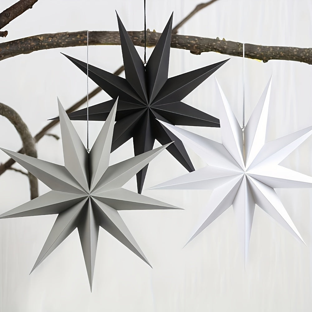 3 black, grey, and white 3D paper star lanterns, each measuring 30.48cm, ideal for Christmas and Xmas party decorations indoors.