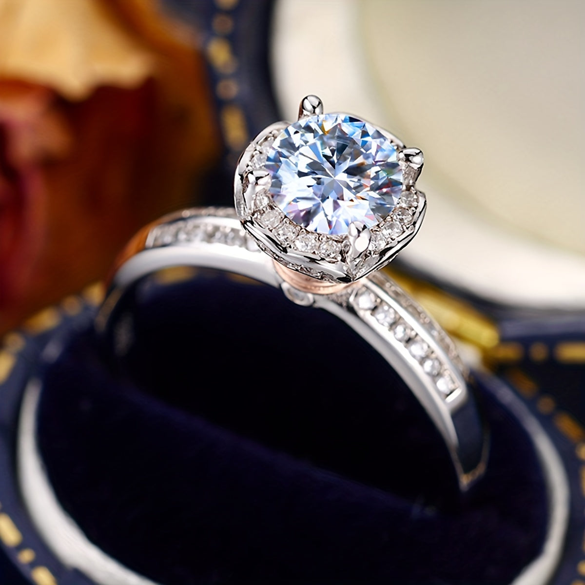 Luxurious wedding proposal ring featuring a stunning flower design crafted from 925 silver and set with moissanite gemstones. Includes a moissanite certificate and elegant packaging box.