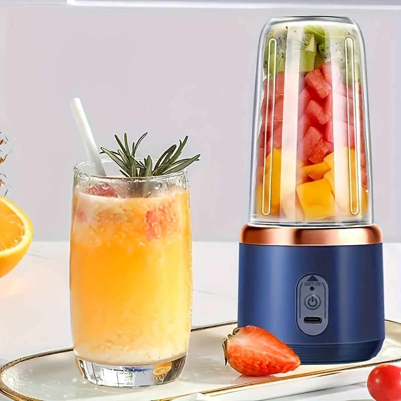 Compact USB rechargeable portable juicer cup in sleek pink and blue with safety lock, perfect for making smoothies and fresh juice on the go. Includes juice container, great for both home and travel.