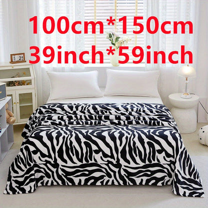 Zebra Patterned Blanket, Luxuriously Soft Throw Blanket Ideal for Snuggling Up on the Couch, Sofa, Office, Bed, Camping or Travel. The perfect multi-purpose gift blanket that can be used in all seasons.