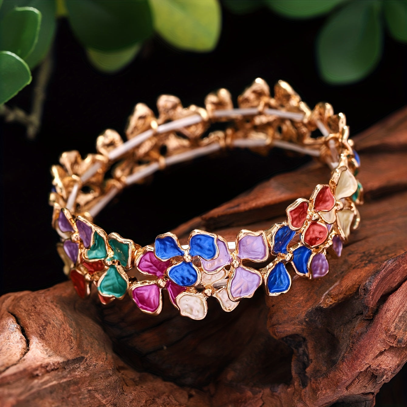 Elegant and timeless, this colorful enamel flower bracelet is made of high-quality zinc alloy. It is designed for women and features a fashionable stretch bangle style that is 18K golden plated. Perfect for daily wear, parties, and holidays, this