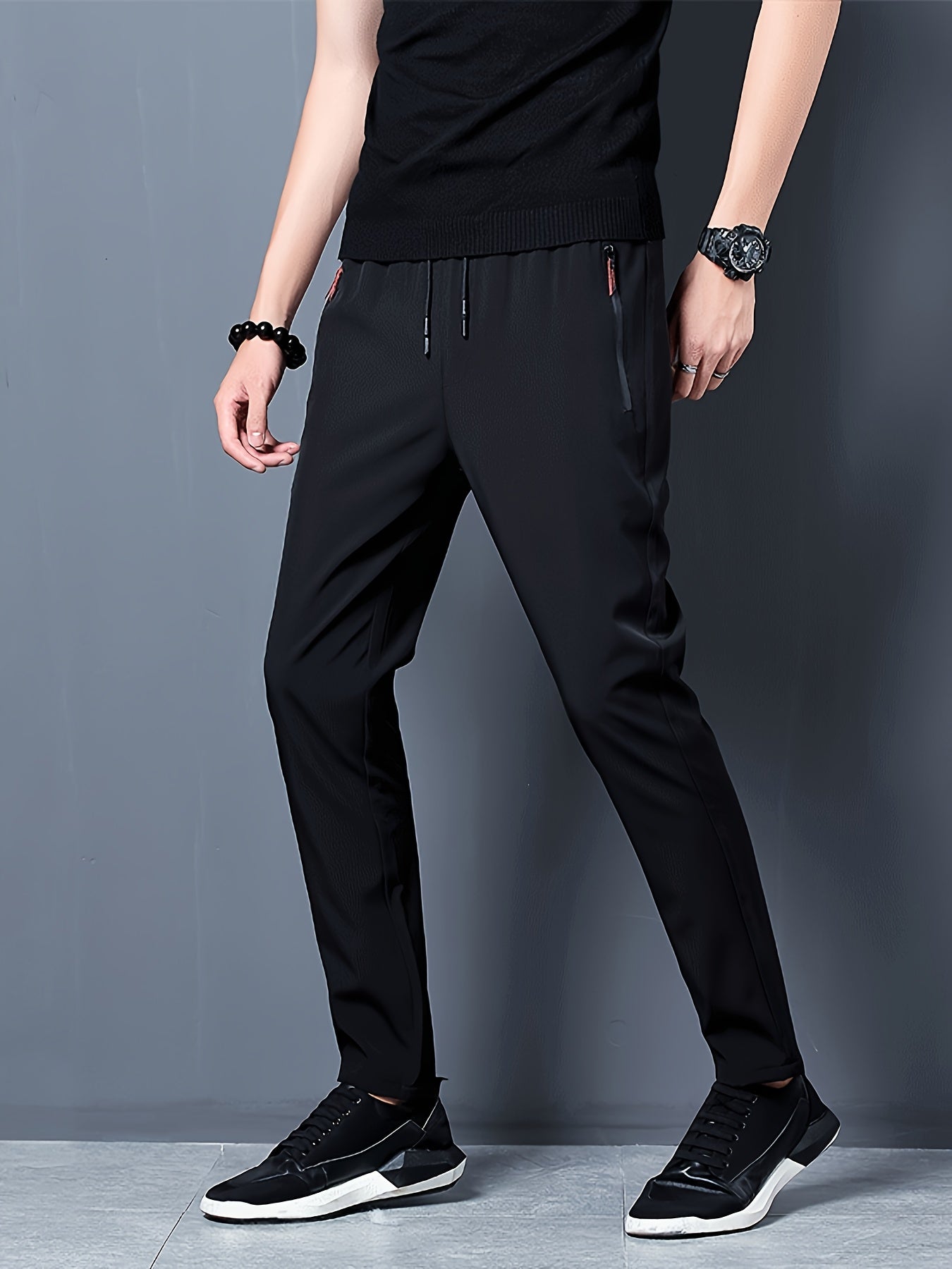 Men's loose solid pants with zipper pockets, casual drawstring barrel trousers for outdoor activities