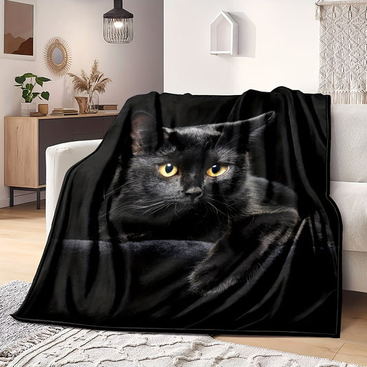 Soft and warm, this black cat print flannel blanket is perfect for cuddling up on the couch, in the office, or while camping or traveling. It also makes a great holiday gift for anyone who loves cozy blankets.