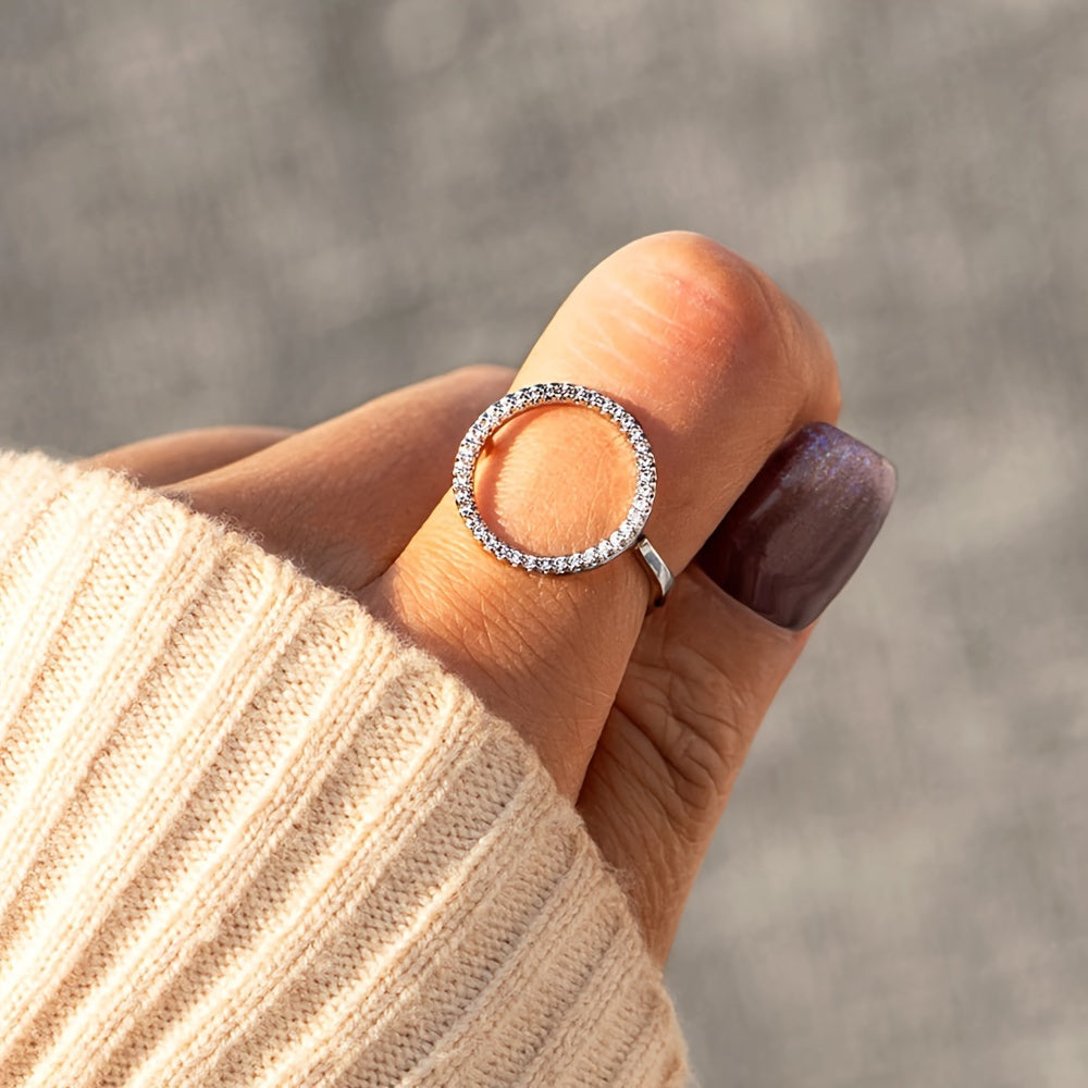 High quality jewelry featuring a sparkling circle design paved with shining zirconia stones, this 925 sterling silver ring is plated with 14k gold. Choose from golden, silvery, or rose golden tones to suit your preference.