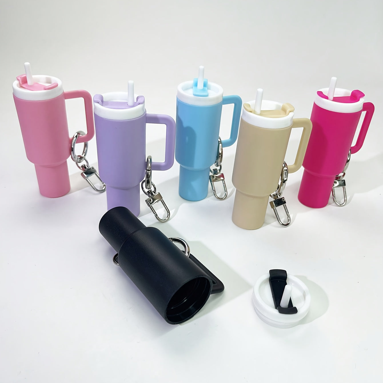 Set of Mini Nonpareil Drink Container Keychain includes 6 pieces out of a set of 10. Includes removable lipstick and lipgloss organizer. Made of funky PVC material, this keychain is ideal for backpacks and car keys. Perfect gift for friends and sports