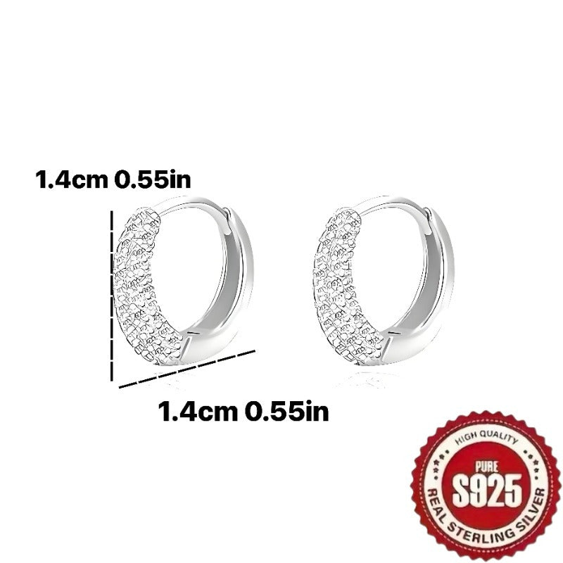 A pair of S925 sterling silver earrings with synthetic zirconia in a creative geometric design, perfect for everyday wear or parties.