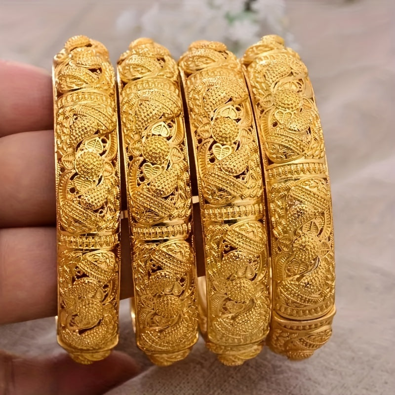 Handcrafted from 24K gold plated copper, this cuff bracelet features a tribal luxury hollow flower design. It makes for a stunning traditional engagement or wedding jewelry gift for women, with no mosaic material used in its creation. Perfect for daily