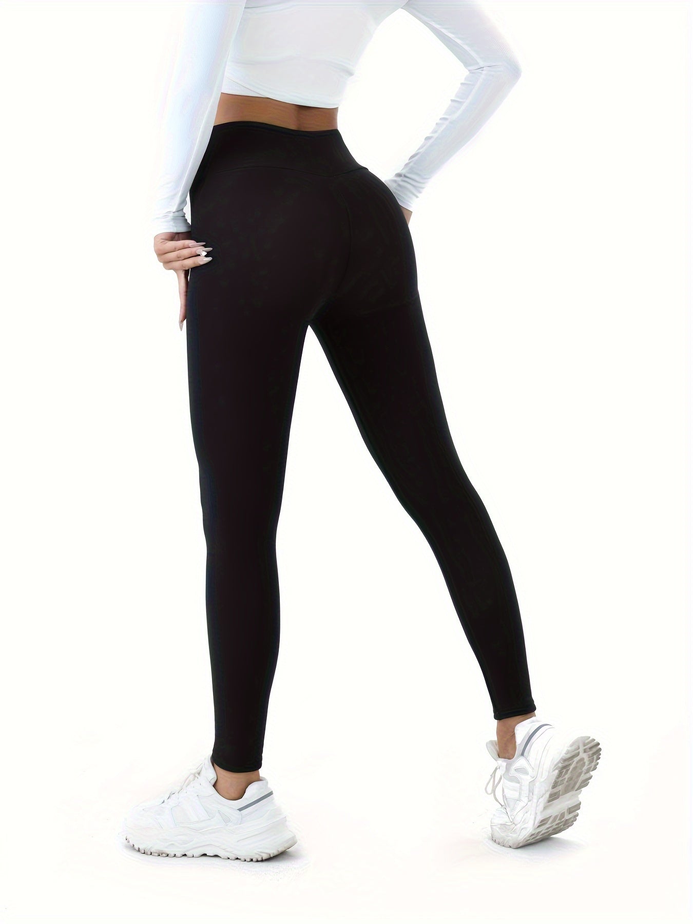 High-waist thermal leggings for women, ideal for fall/winter, solid color with knit fabric.