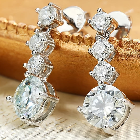 These Y2K-inspired 925 sterling silver earrings feature a dazzling 2.6-carat moissanite stone with a simple yet luxurious design. Perfect for everyday wear, vacation outings, dates, parties, and weddings, these earrings are ideal for women who love a