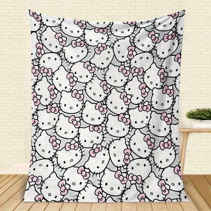 Stay warm and cozy with this adorable Sanrio Hello Kitty Print Flannel Fleece Throw Blanket! Perfect for adults, this all-season blanket is incredibly soft and plush, making it ideal for snuggling up on the sofa, bed, or even while camping or traveling.