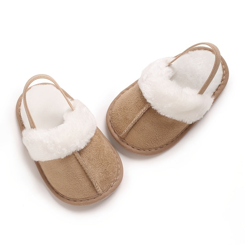 Soft and cozy plush baby girl slippers with non-slip sole for indoor comfort, perfect for 0-1 year olds in spring and fall.