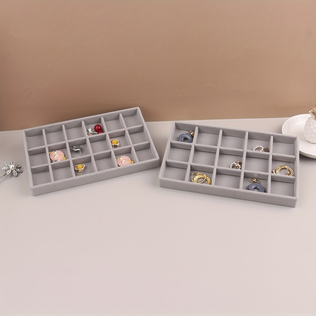 1 piece Grey Velvet Jewelry Tray with compartments for necklaces, bracelets, earrings, rings, bangles, and watches, with a velvet drawer for organization.