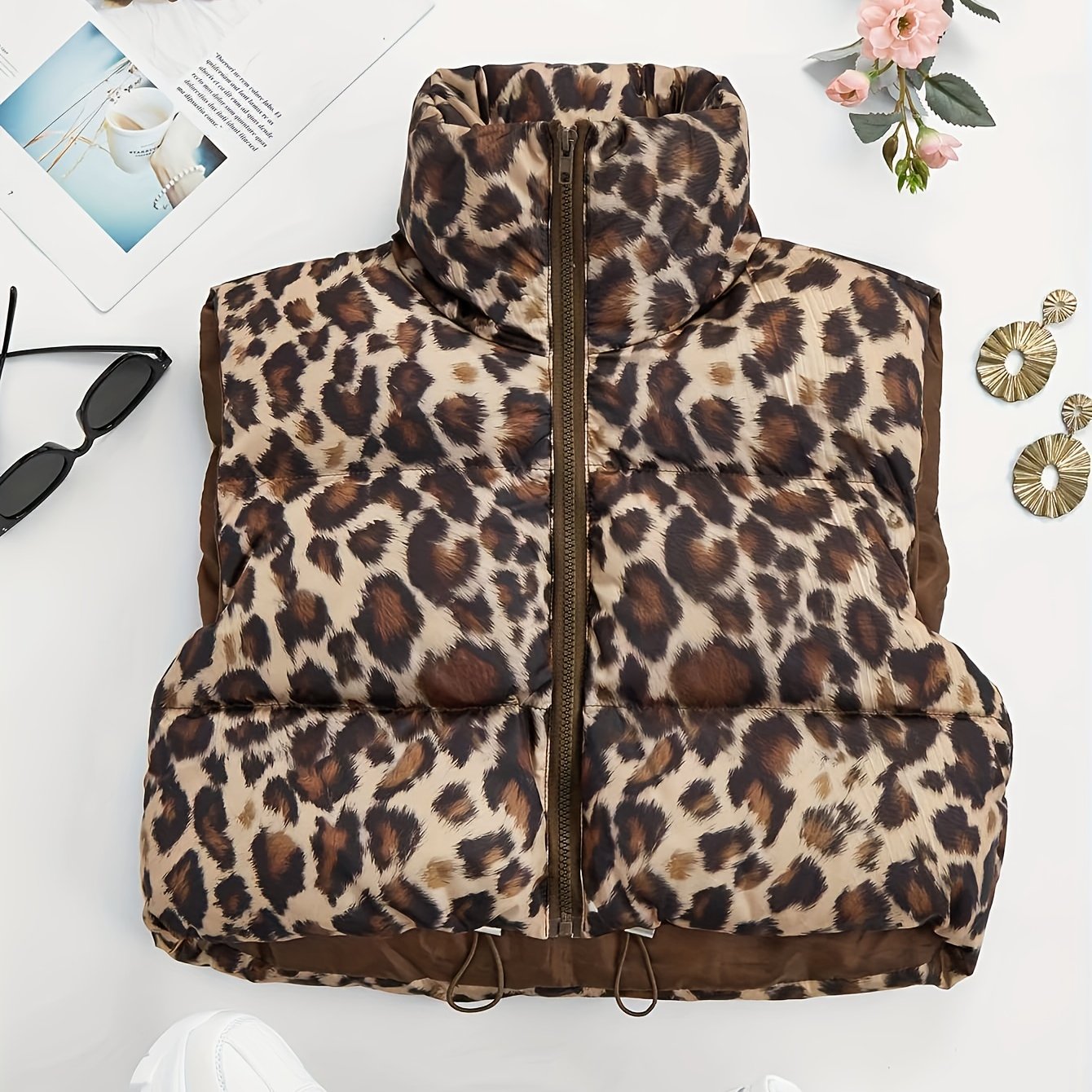 Women's leopard print padded coat with high neck drawstring, made of 100% polyester woven fabric for fall/winter outerwear.