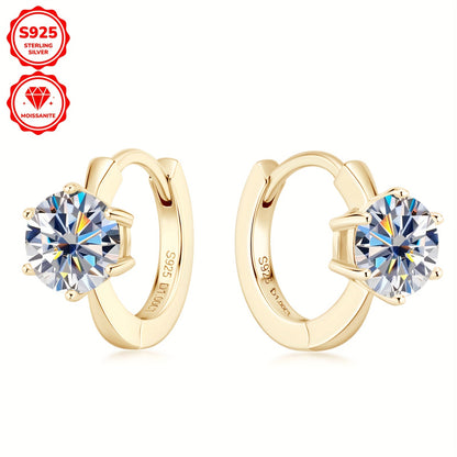 These elegant earrings feature a pair of round Mozambique stones, each 6.5mm in diameter and D color. The stones are set in a single six-prong setting with a 10mm inner diameter, crafted from 925 sterling silver. Accompanied by a GRA certificate, these