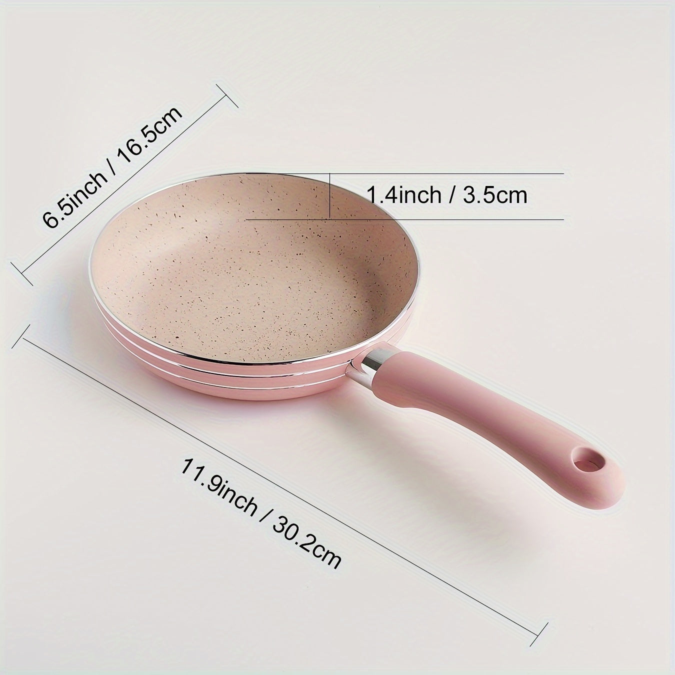 This 16.51 cm Non-Stick Aluminum Skillet features a Silicone Handle and is Dishwasher Safe. Perfect for cooking Eggs and Steaks, this Mini Frying Pan is compatible with Gas Stoves.