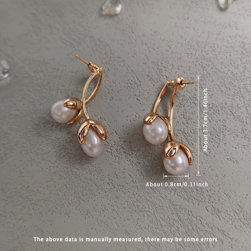 Vintage and elegant pearl drop and dangle earrings for women with natural freshwater pearls, measuring 8mm. Made with alloy ear needles and no plating. Features June birthstone. Comes in a gift box, perfect for daily wear. Includes one pair.