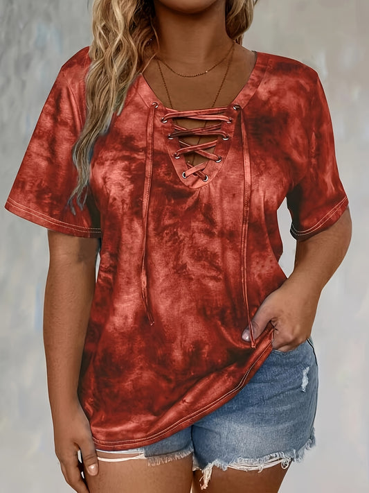 Plus size tie dye print t-shirt for women, made of polyester knit fabric with spandex. Features a lace-up drape neck detail and medium stretch. Ideal for spring/summer casual wear.