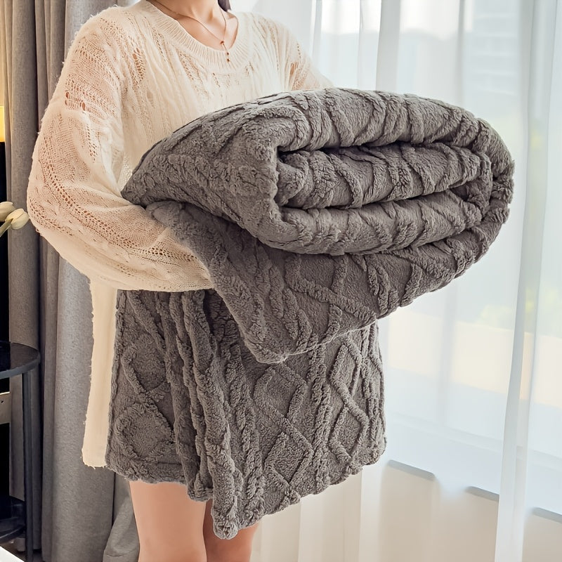 Stay warm and cozy with the LARMPAT Cozy Taffeta Blanket. This soft and warm beige blanket features geometric patterns and is machine washable for easy care. Perfect for all seasons, this blanket is suitable for use on your bed, sofa, or even while