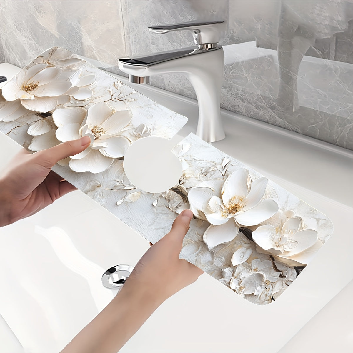 Add a touch of elegance to your kitchen or bathroom with this 3D floral faucet mat in white. Made of durable and moisture-proof polyester, it is splash absorbent and features a suction cup for easy installation. Perfect for adding some style to your