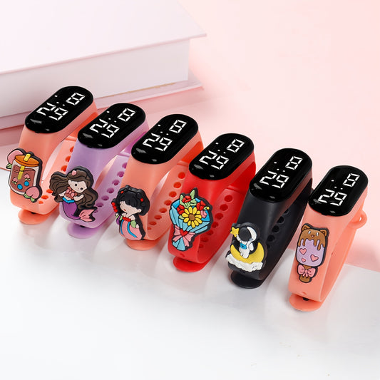 6 cute cartoon LED wristwatches for youngsters in vibrant colors. Large display, battery-operated with TPU strap. Fun and educational for students. Not waterproof.