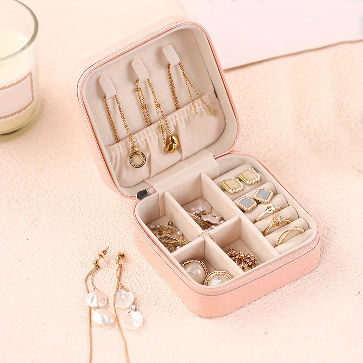 Travel-friendly jewelry organizer for rings, necklaces, and earrings.