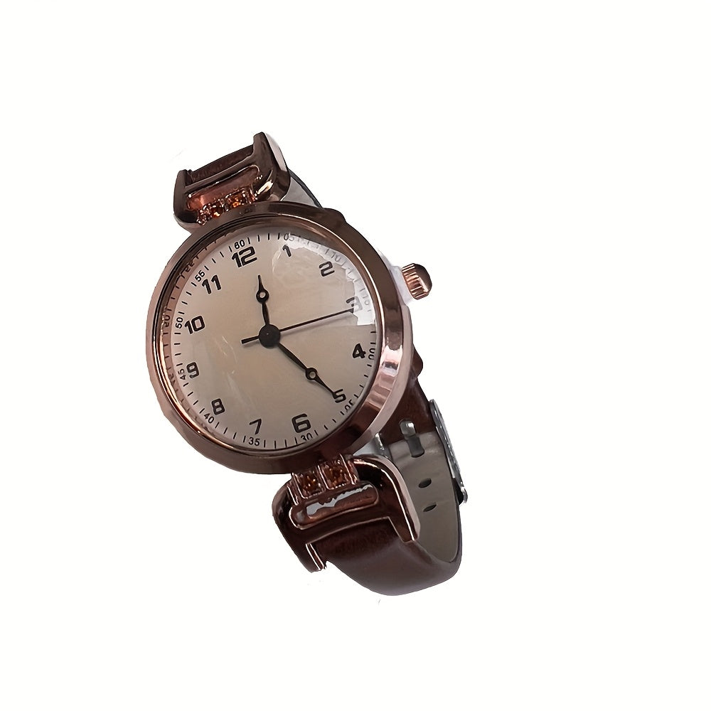 Elegant vintage-inspired women's watch with quartz movement and synthetic leather strap, non-rechargeable button battery.