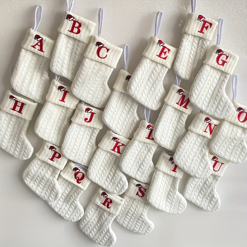 White cable knit stocking with embroidered 'F' - Ideal for indoor decor.