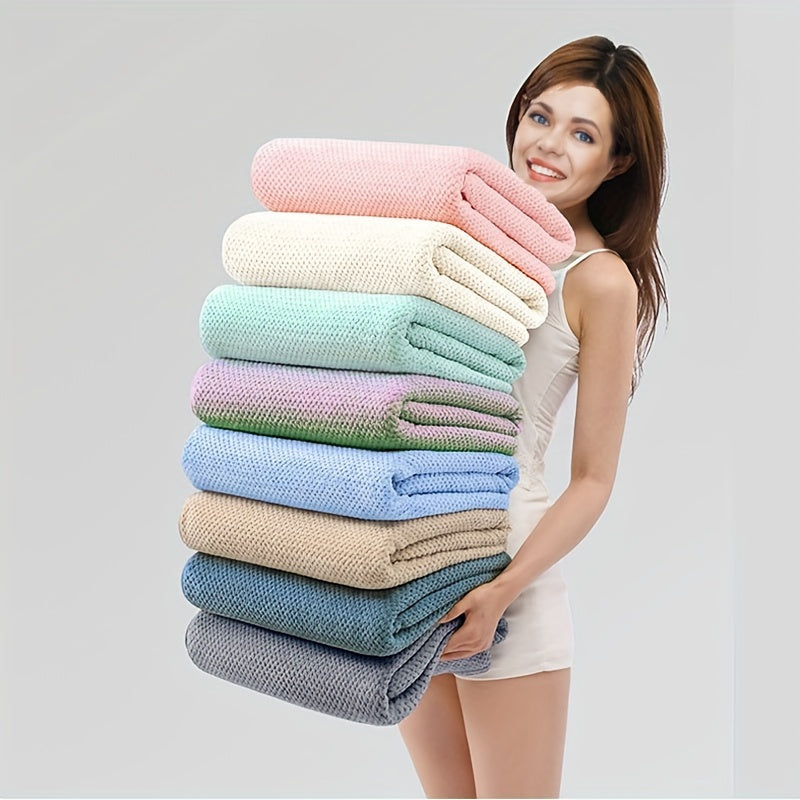 Soft, thick, and large bath towel in a solid color. Absorbent polyester blend, machine washable. Great for home bathrooms, ideal for Christmas.