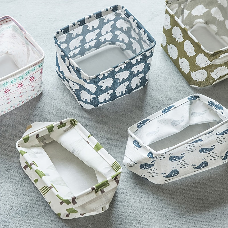 Waterproof desktop storage box made of printed cotton and linen with handle, suitable for organizing sundries.