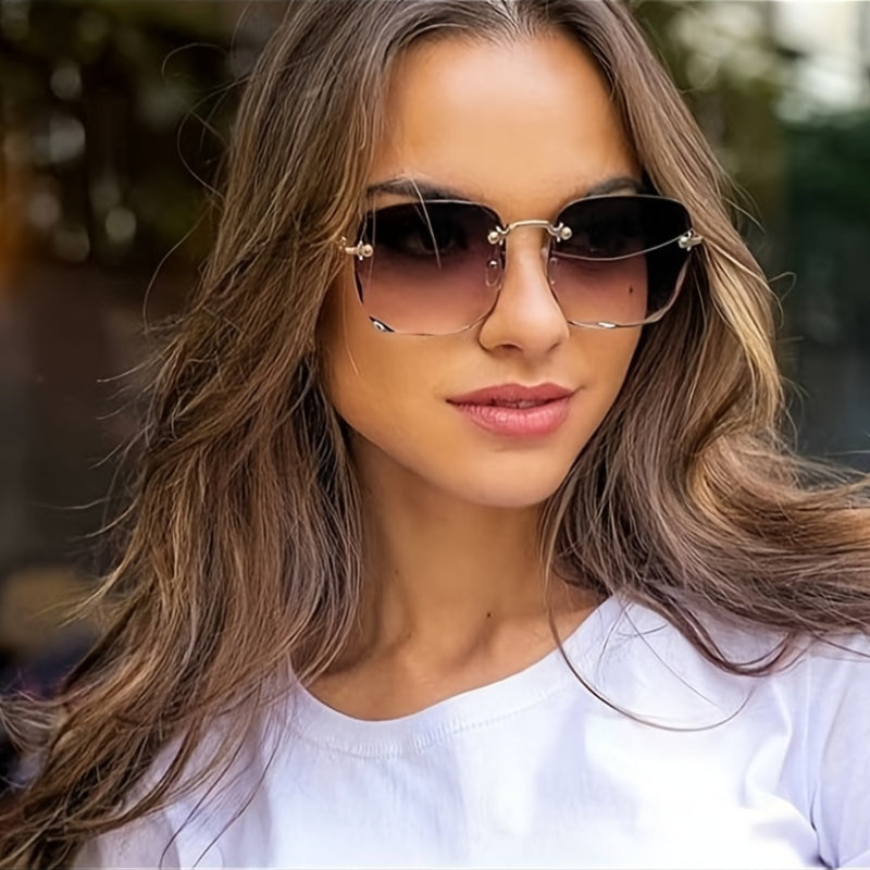 Women's square frameless dress-up glasses with gradient colored lenses and fashionable cut edges.