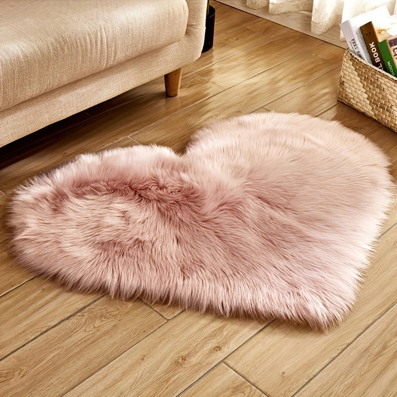 Heart-Shaped Faux Sheepskin Rug - Perfect for Celebrating Special Occasions!

Add a touch of festive charm to your home with this adorable 1pc Heart-Shaped Faux Sheepskin Rug. Measuring 50.01cm x 70.0cm, this rug is made from a soft blend of acrylic and