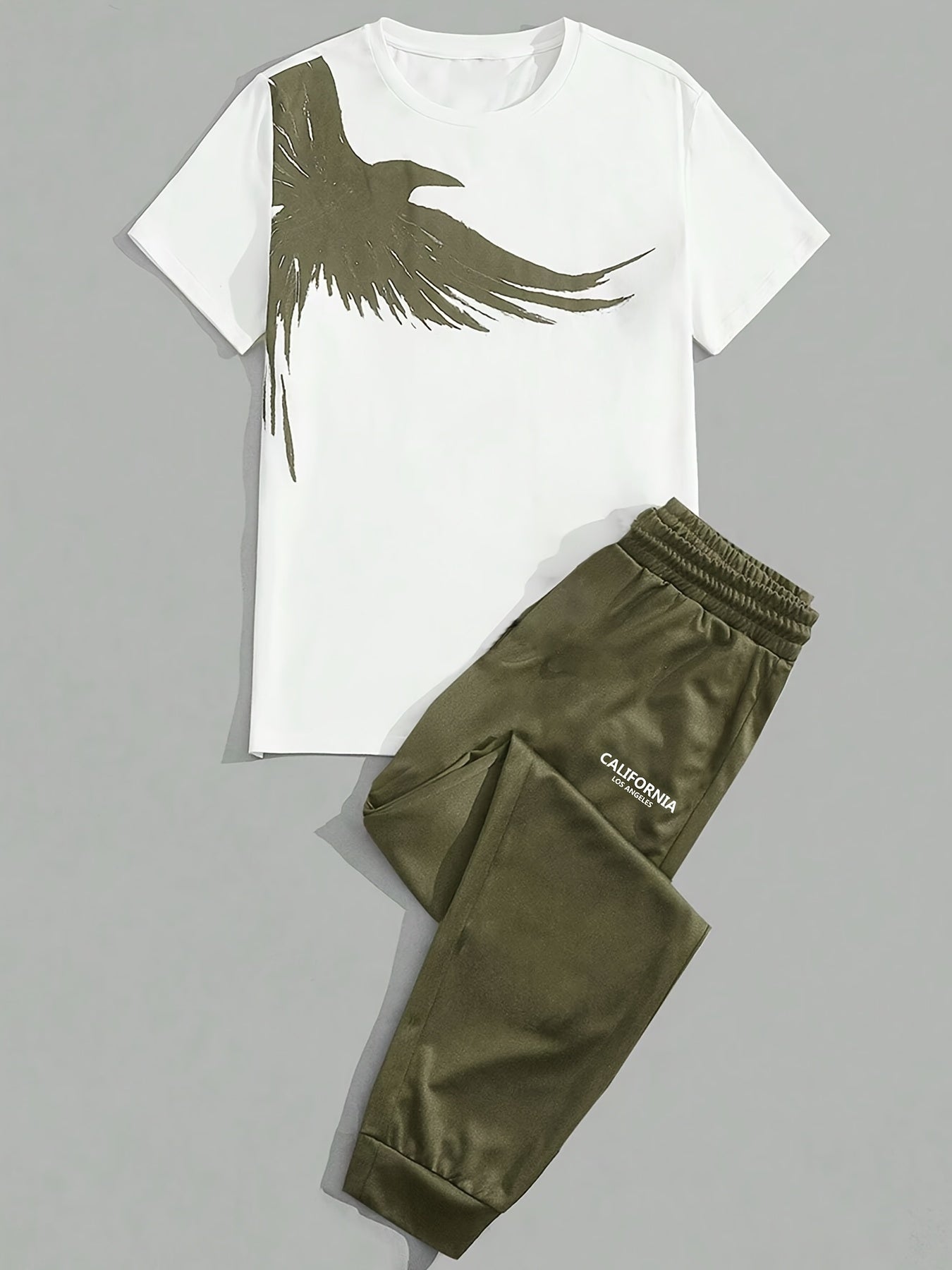 Men's summer outfit with eagle print tee and long pants, great for sports and leisure