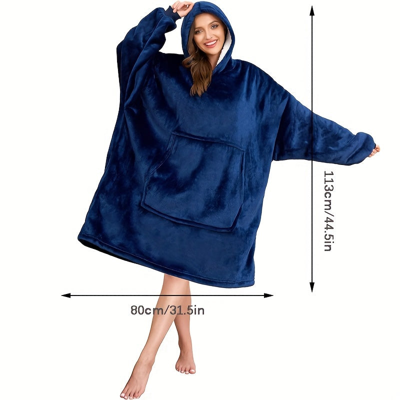 One piece of an oversized hooded blanket made from super soft flannel fabric. This wearable blanket features a stylish hood and a convenient pocket, providing warmth and comfort in cold weather.