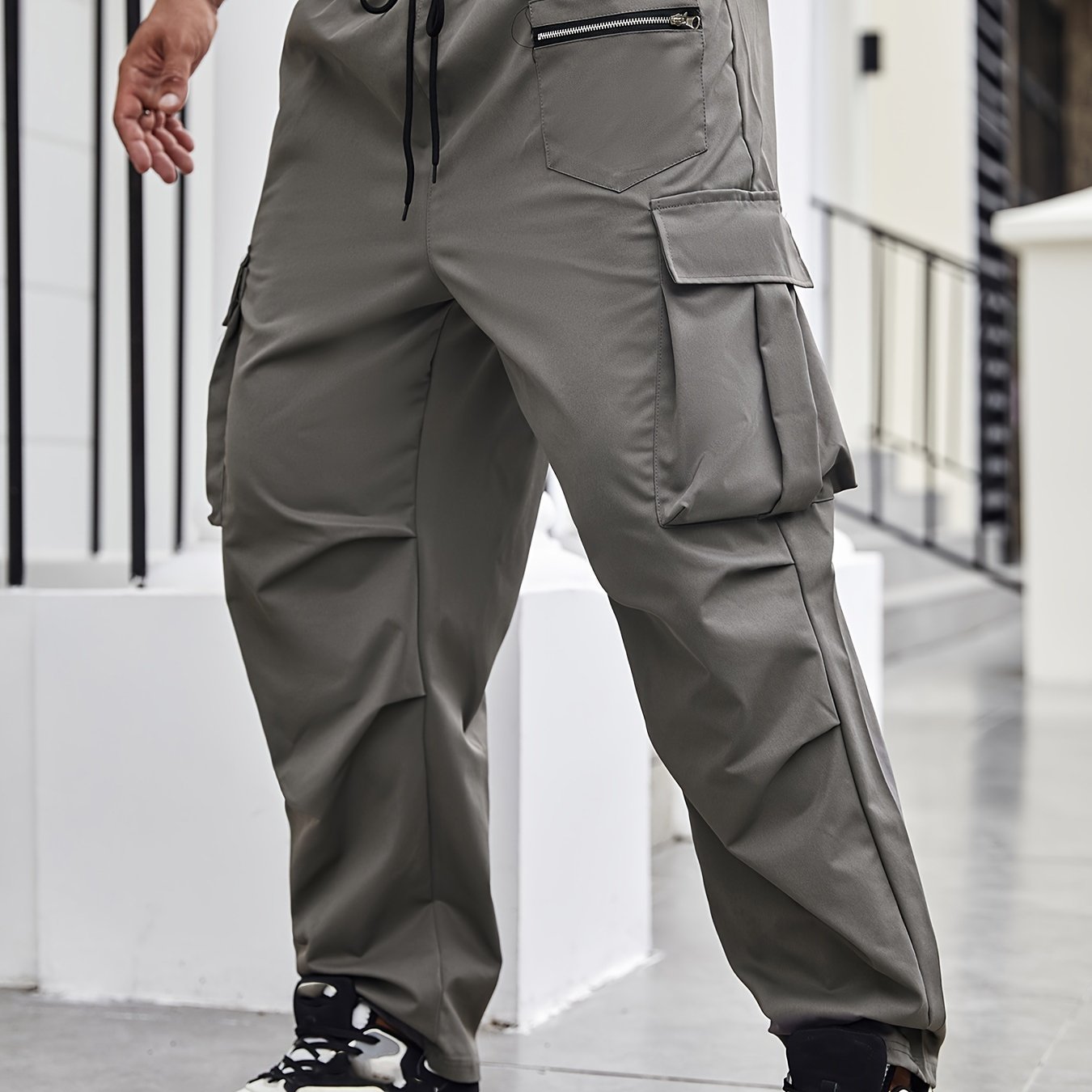 Durable polyester cargo pants for men in plus sizes, suitable for all seasons.