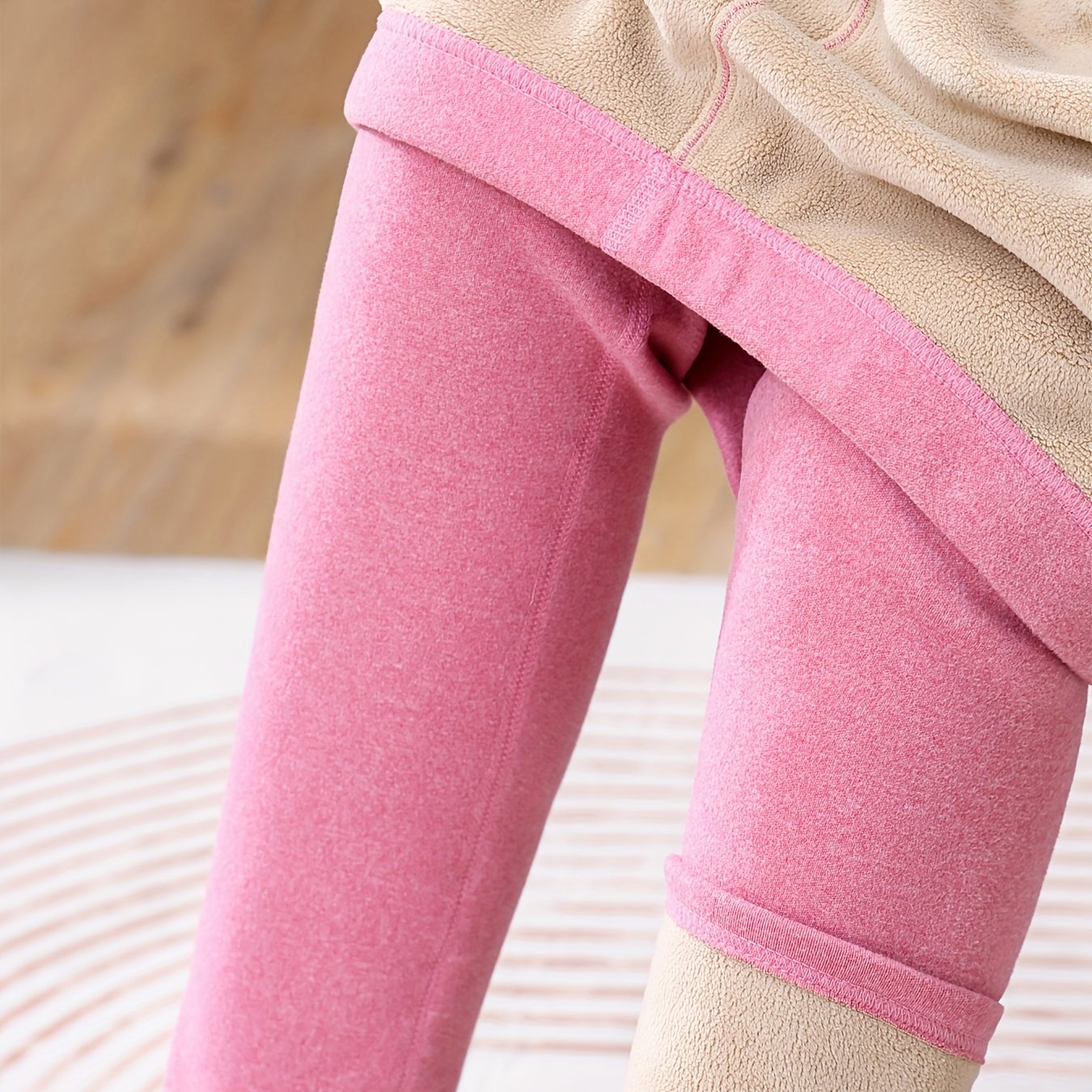 High waist fleece-lined leggings in pink and beige for autumn/winter, providing warmth and tummy control with a butt lift effect for workouts.