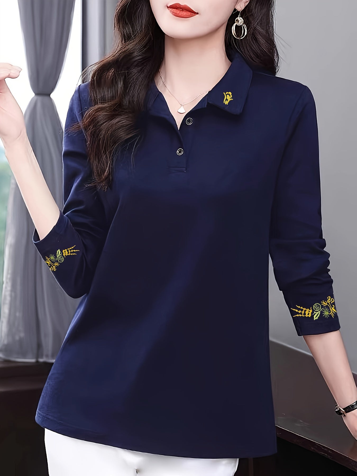 Women's stylish black long sleeve shirt with floral details - soft, comfortable, and breathable for casual wear in spring/fall.