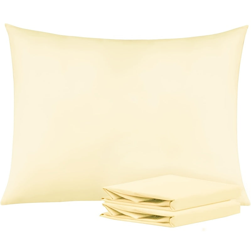 Get two sets of white pillowcases that are perfect for families, hotels, and apartments. These pillowcases provide a comfortable experience with their soft and breathable material. Made of high-quality fabric, they are suitable for bedroom, sofa, and