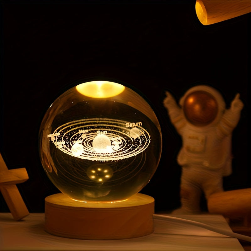 This 3D laser-engraved crystal ball night light features the Solar System with a focus on Saturn. It is USB powered and makes a perfect gift for any occasion.