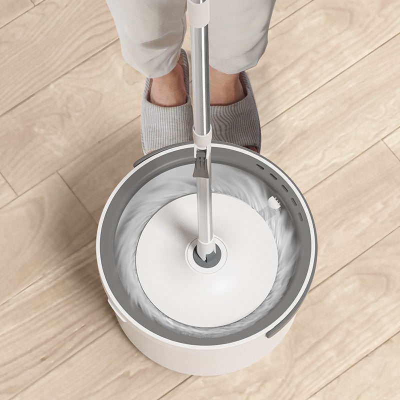 Get the ultimate cleaning solution with our Dual-Use Spin Mop. This hands-free washing system allows for wet and dry floor cleaning in any room of the house - from the living room to the bathroom and kitchen. With efficient separation of dirty water