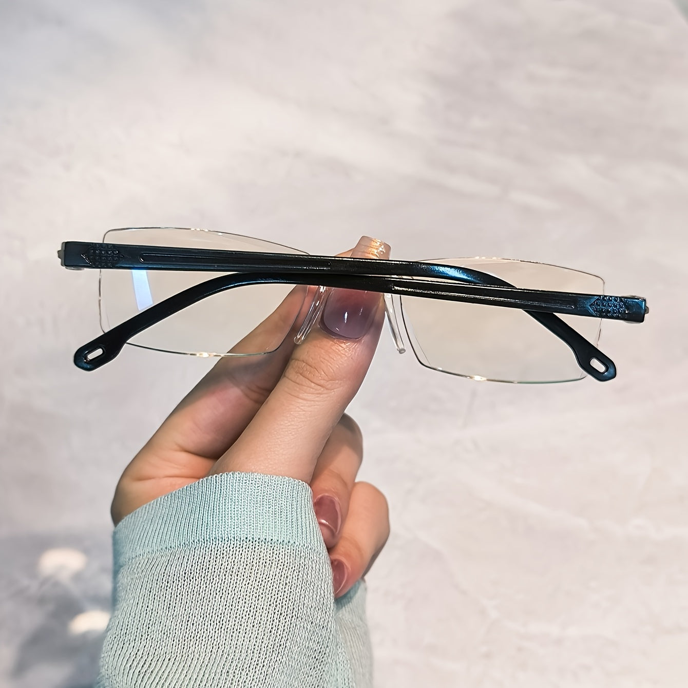 4 Rimless Blue Light Blocking Reading Glasses for Men and Women, designed to reduce eyestrain.