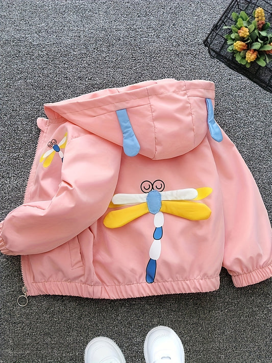 Girls' pink lightweight hooded windbreaker with playful cartoon face design and bow detail. Zip-up style made from polyester blend, perfect for spring and autumn.