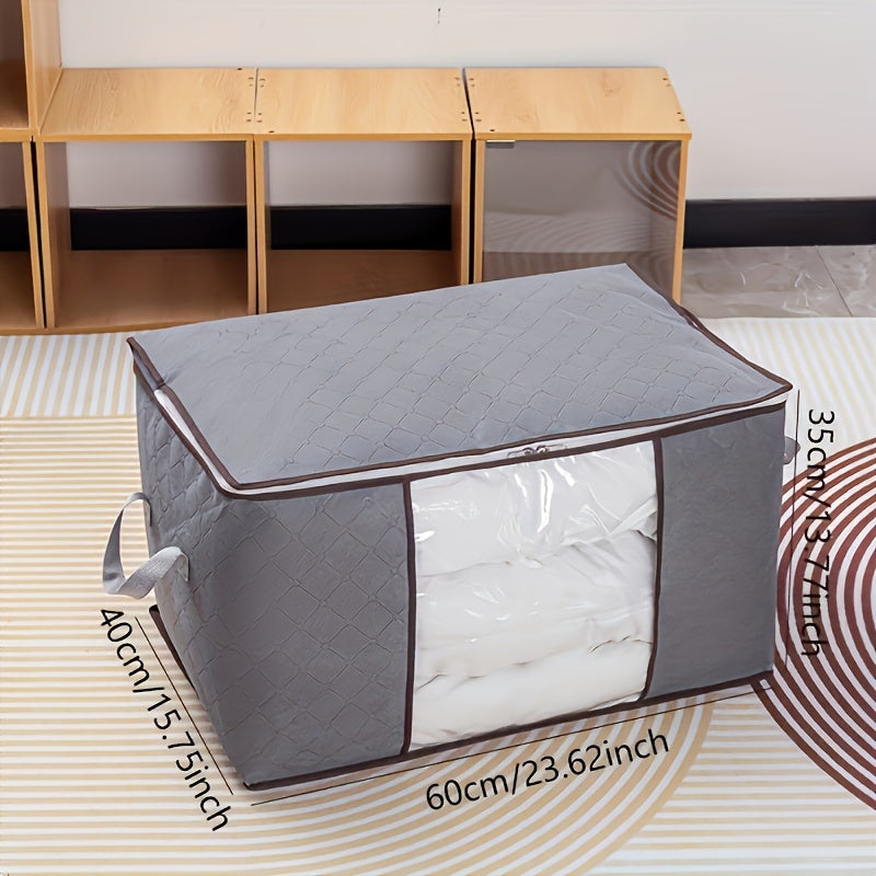 Big fabric bag with clear window for storing clothes and blankets.