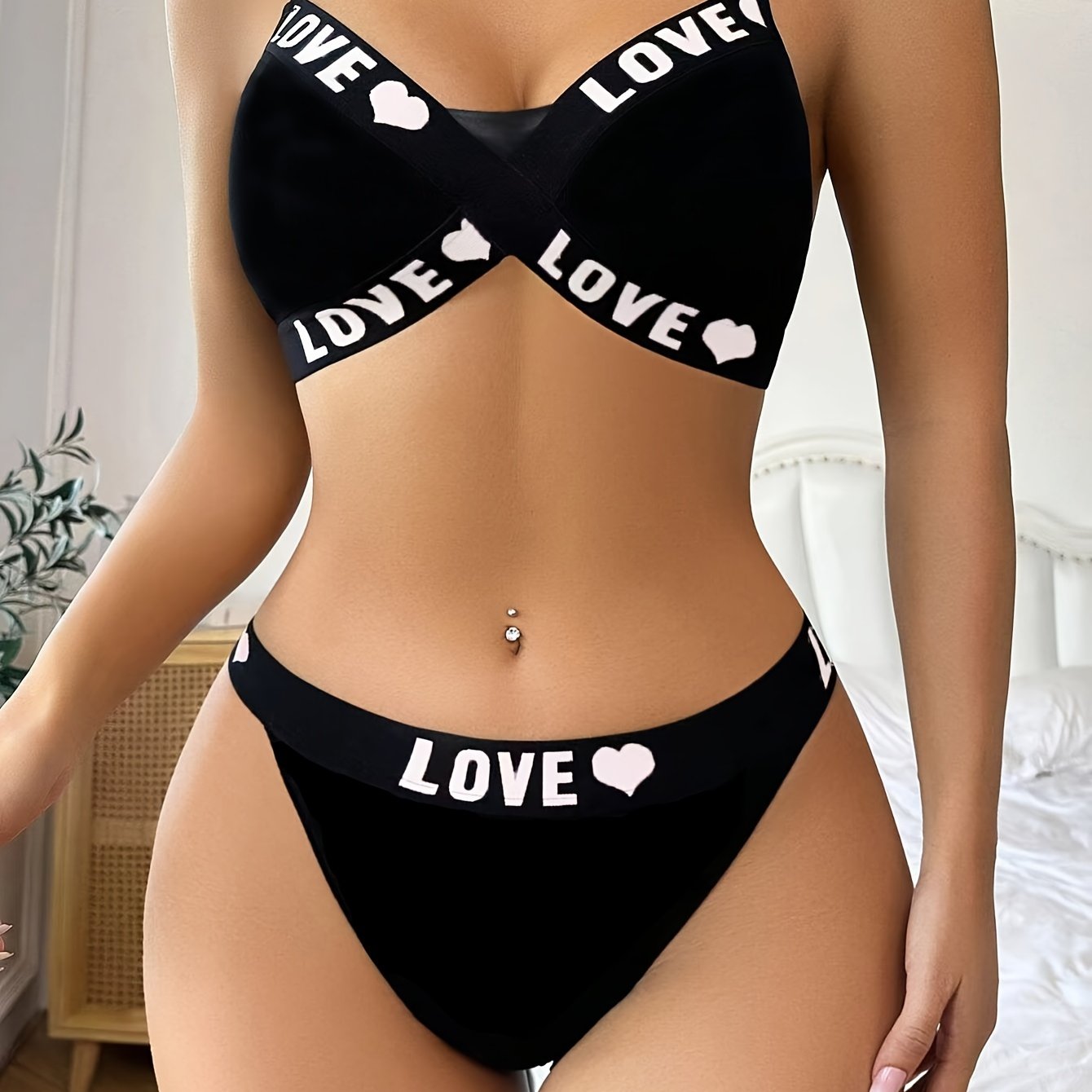 Medium-support bikini set for women with letter print, made of non-transparent knit fabric that is hand washable.